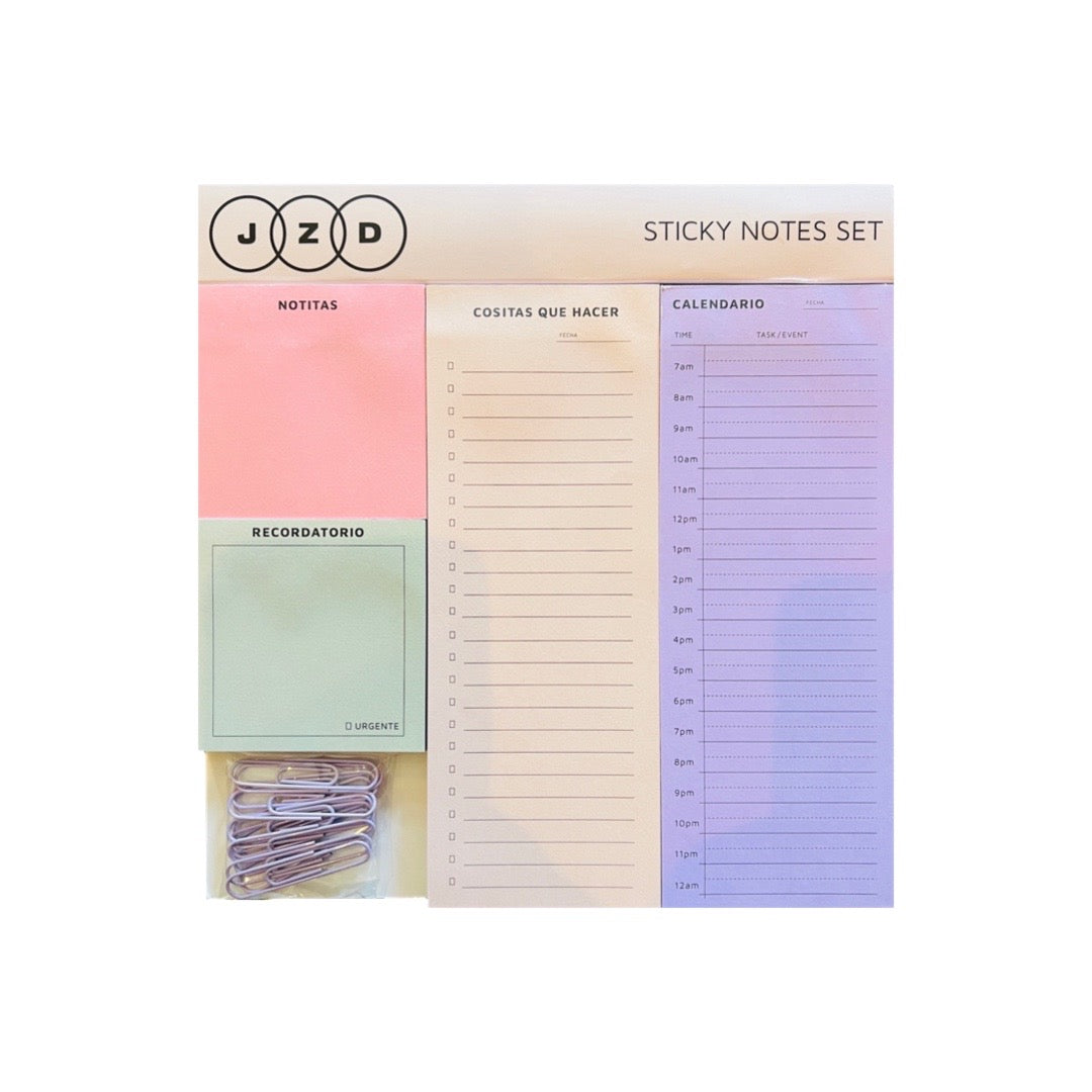 sticky notes set with four different colored notepad and purple paper clips.