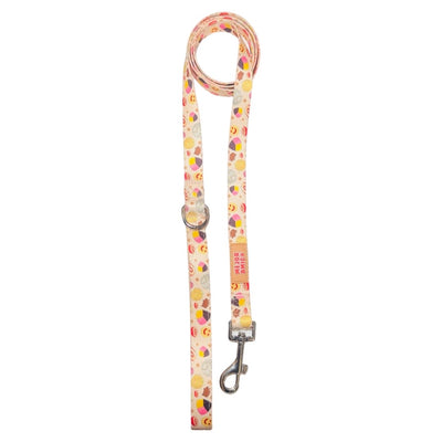 light yellow dog leash with images of pan dulce.