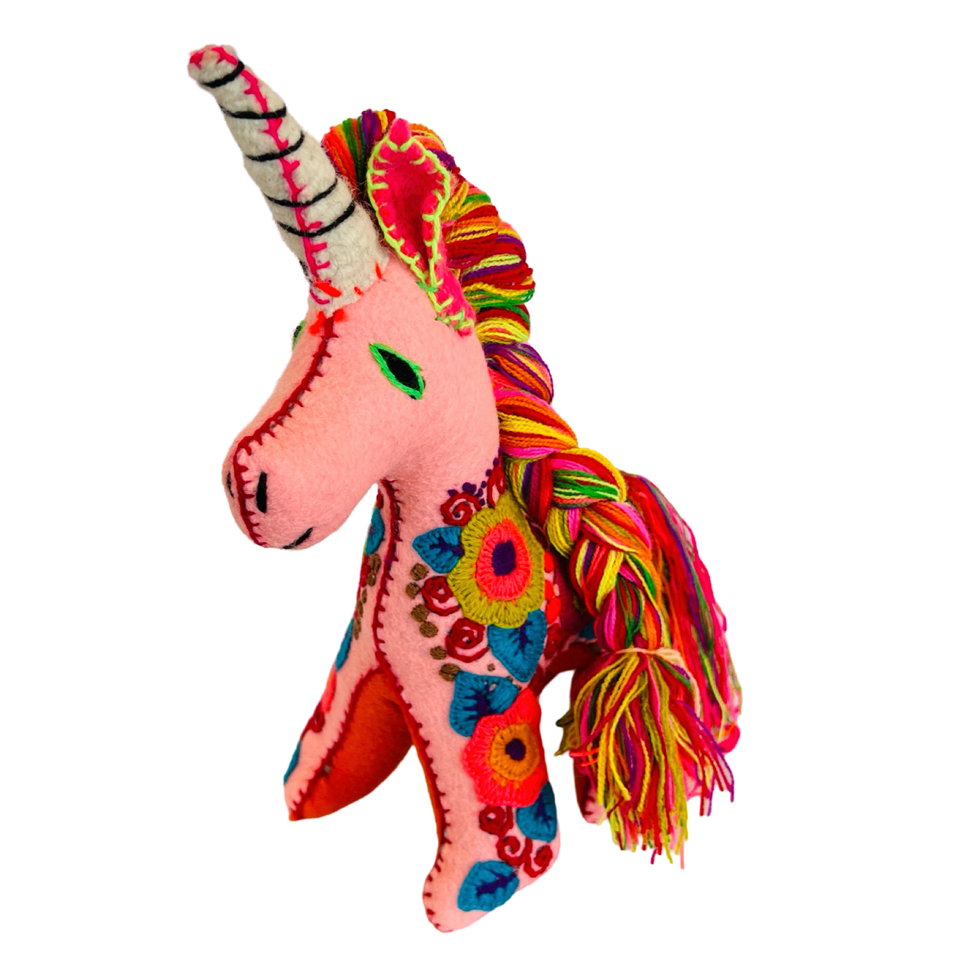 side view of a pink felt unicorn with a floral embroidered design