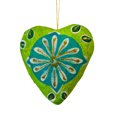 Green heart ornament with a colorful floral design with glitter accents