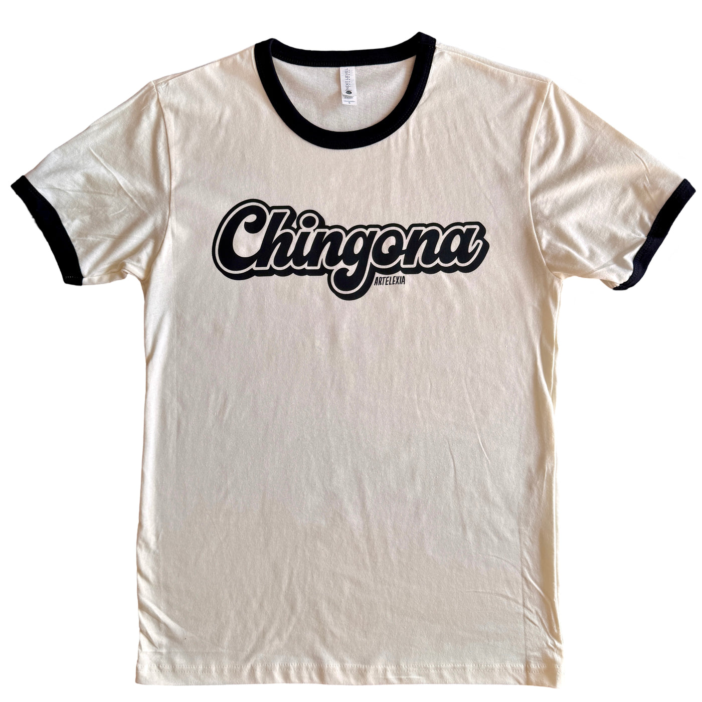 White tee shirt with black trim around collar and opening of sleeves. Black retro graphic across the chest that reads "Chingona"