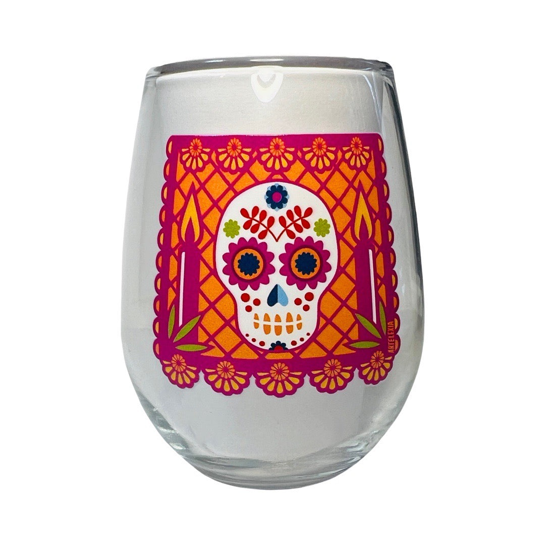 11 oz stemless glass featuring a berry colored calavera papel picado design 