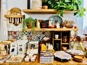 Kitchen counter displaying products for sale inside Casa Y Cocina