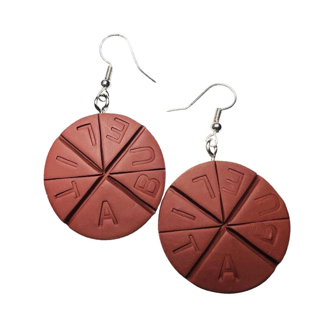 set of brown round earrings in the shape and design of a tablet of Abuela Mexican hot chocolate