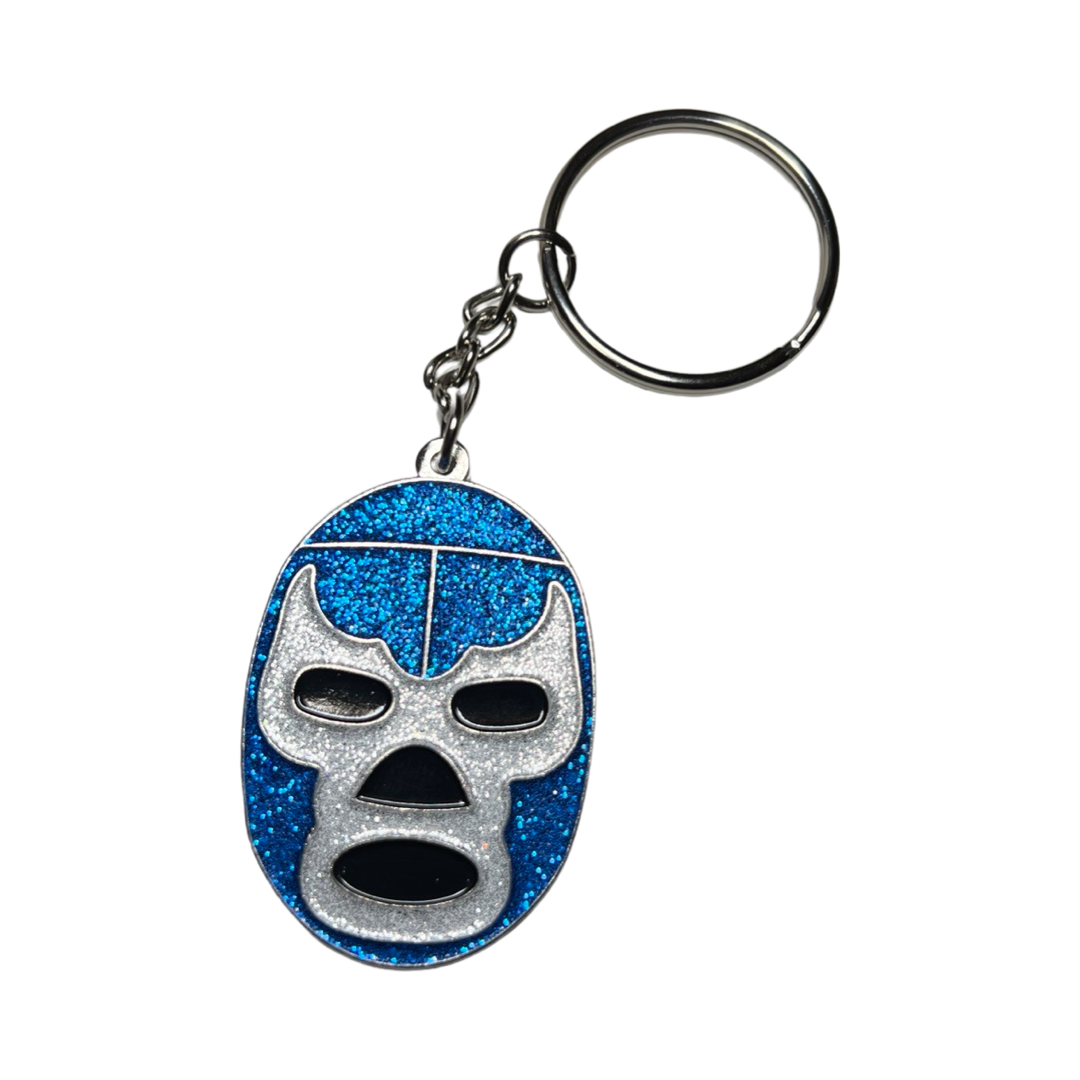 Enamel keychain of a blue and silver luchador mask.