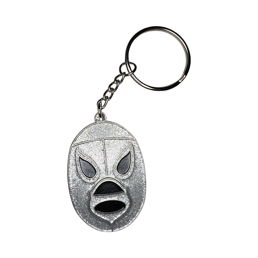 Enamel keychain of a silver luchador mask.
