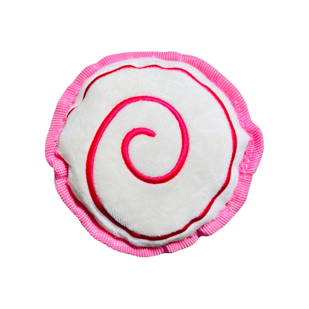 Round pink and white pinwheel pastry dog toy