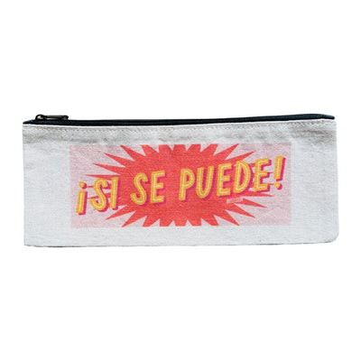 Canvas pencil pouch with an image of the phrase Si se Puede in yellow and white lettering with a light pink and orange star burst background.