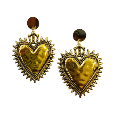 set of brass heart shaped earrings with a spiked design