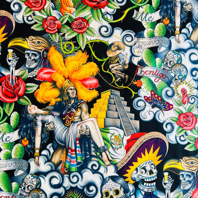 black fabric with the images of an Azte warrior carrying a women and images of a Mexican pyramid, skulls, cactus, butterflies, roses and the Mexican flag
