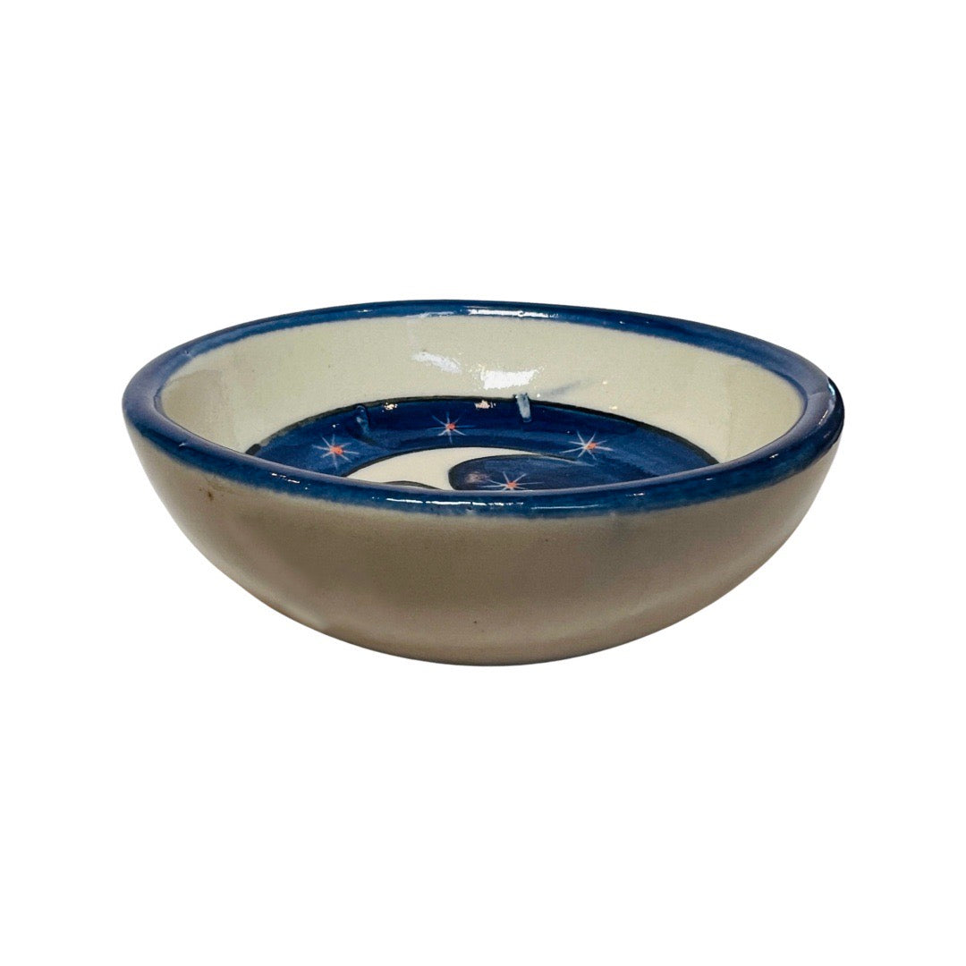 side view of a blue and white stoneware bowl