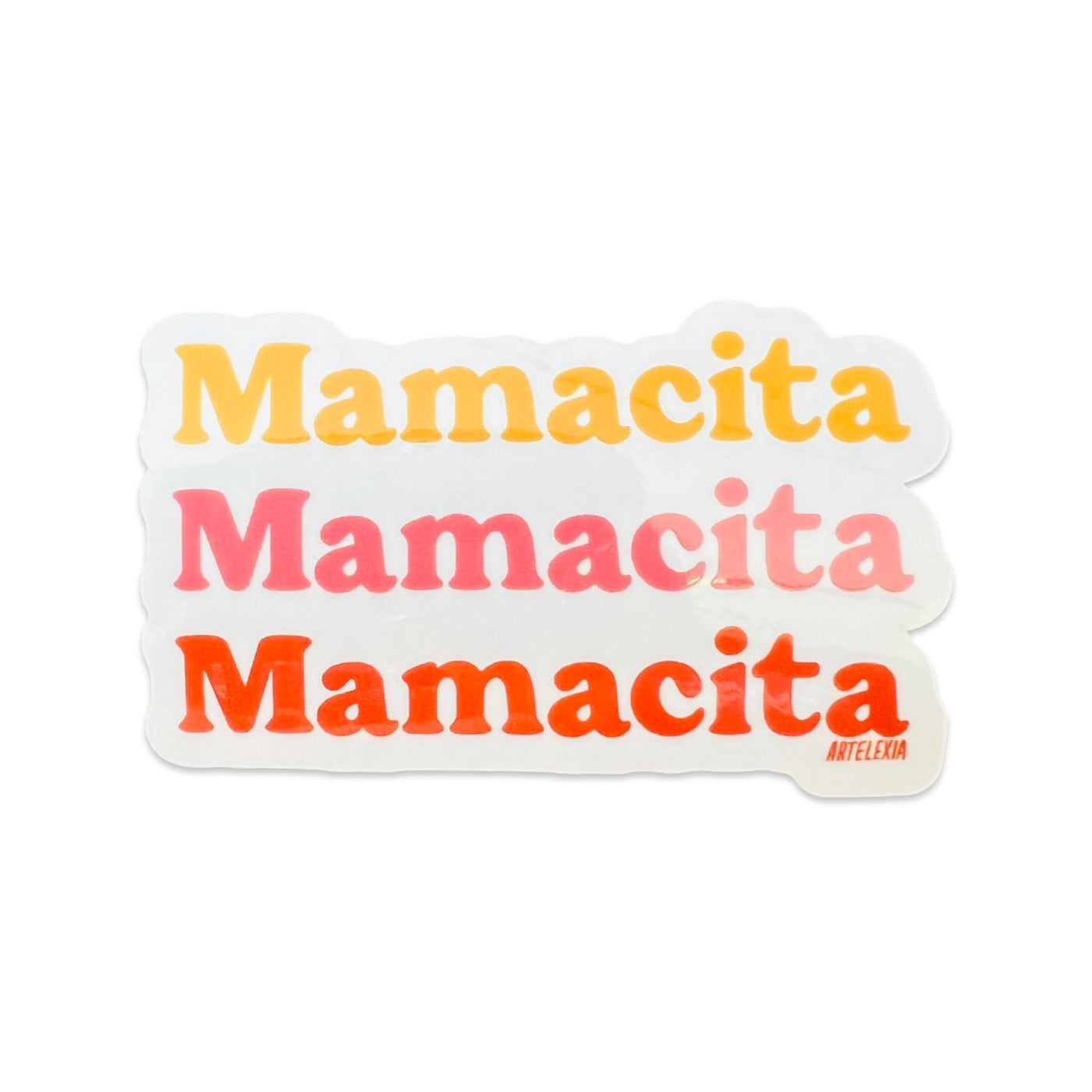 white sticker with the word Mamacita in yellow, pink and orange lettering