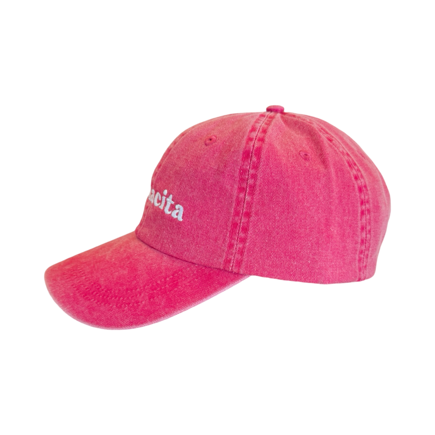side view of a heathered pink hat with the word mamacita in white lettering