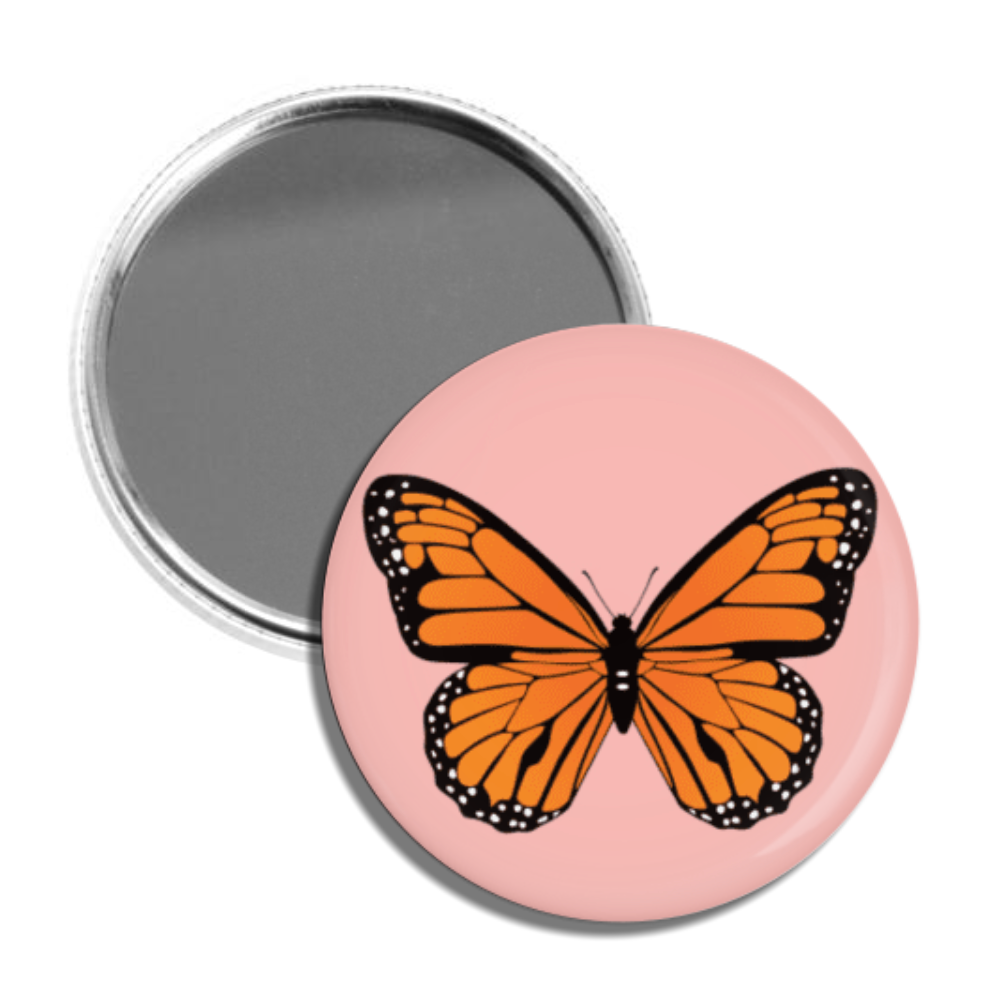 circular pocket mirror with image of a monarch butterfly on the backside