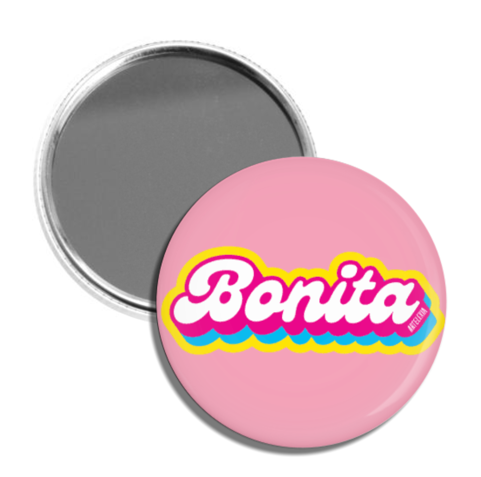 circular pocket mirror with phrase "Bonita" on the backside