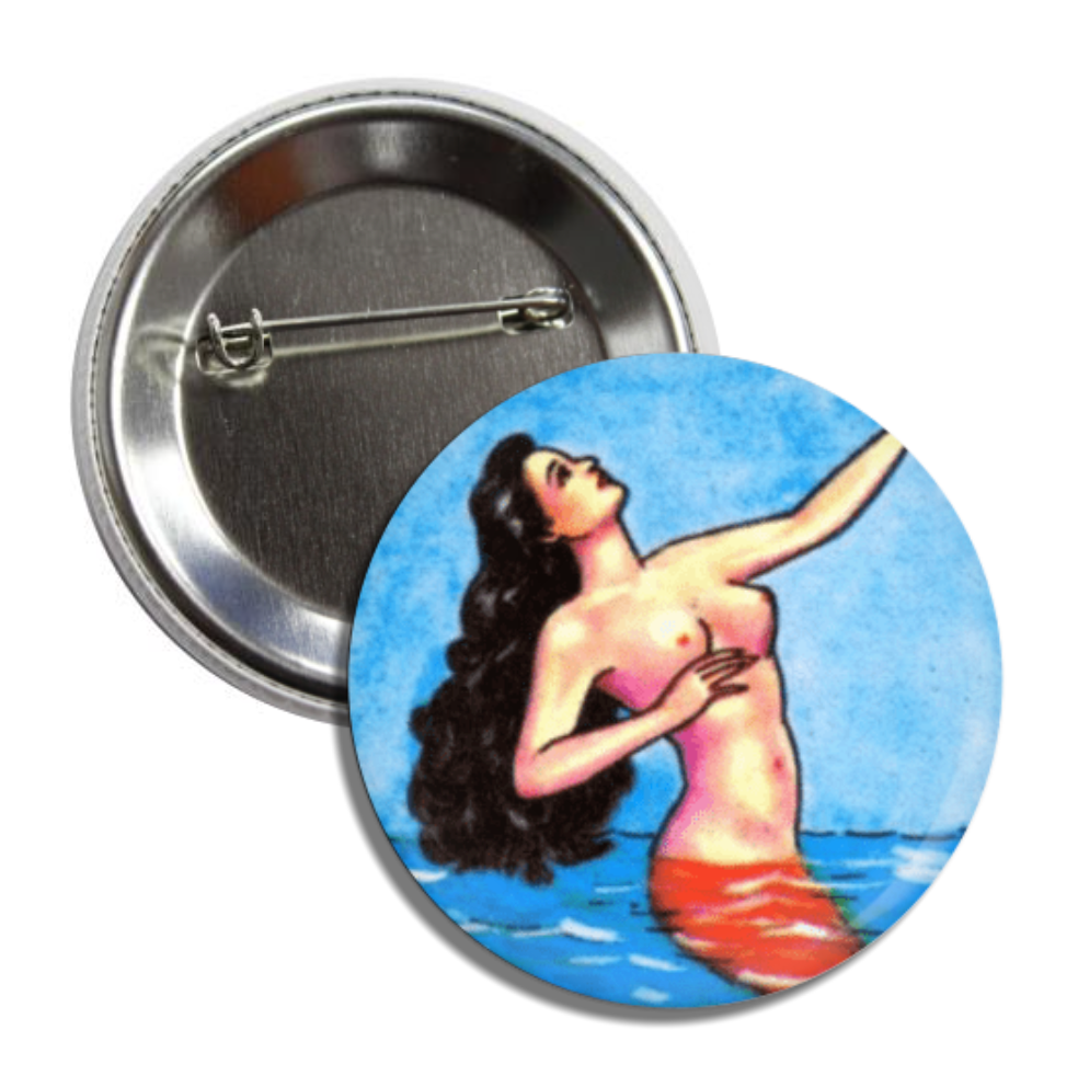 Round pin button with an image of a topless mermaid.