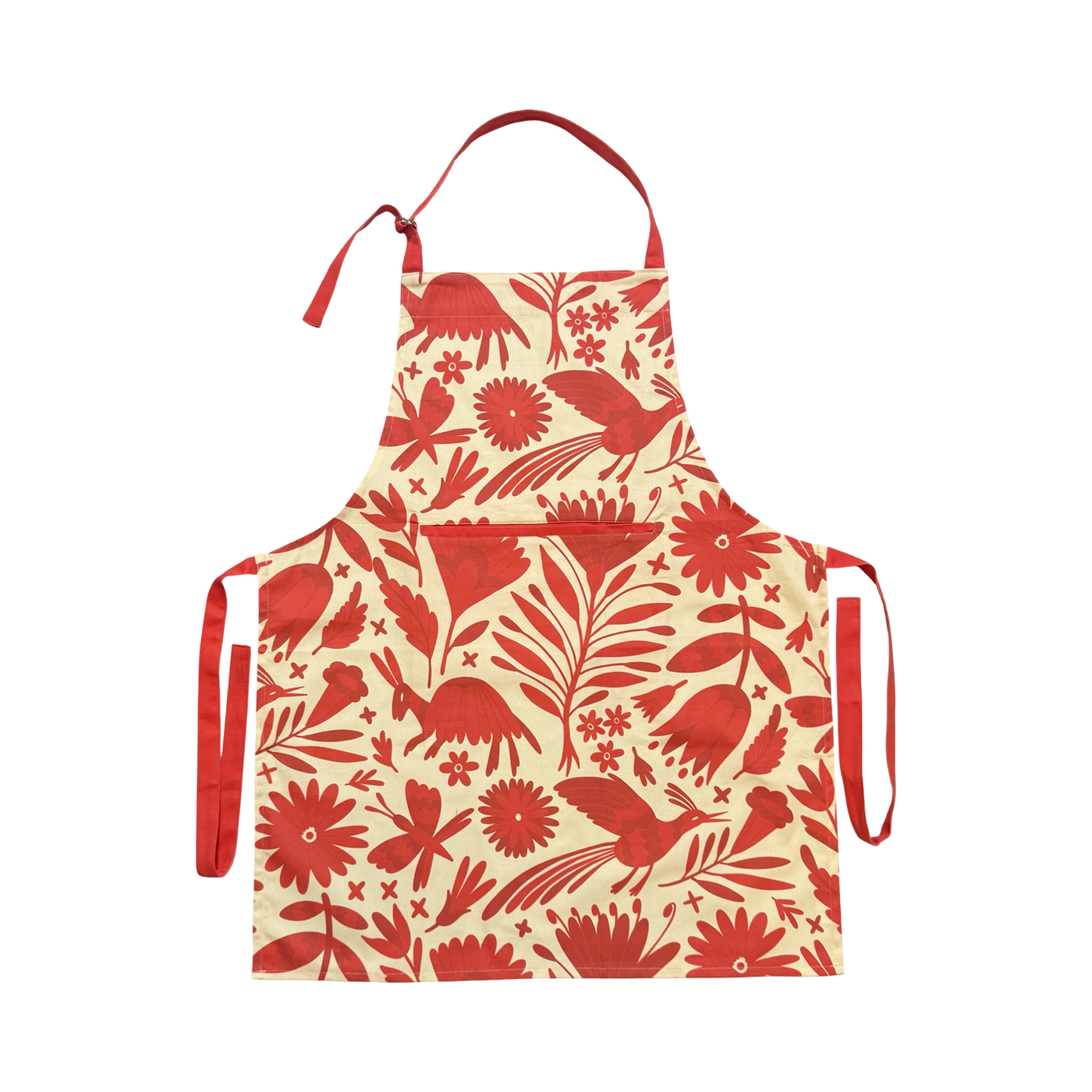 cream apron with a sienna Otomi-inspired design with sienna neck and waist ties.
