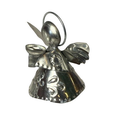 tin shaped angel holding a bowl.