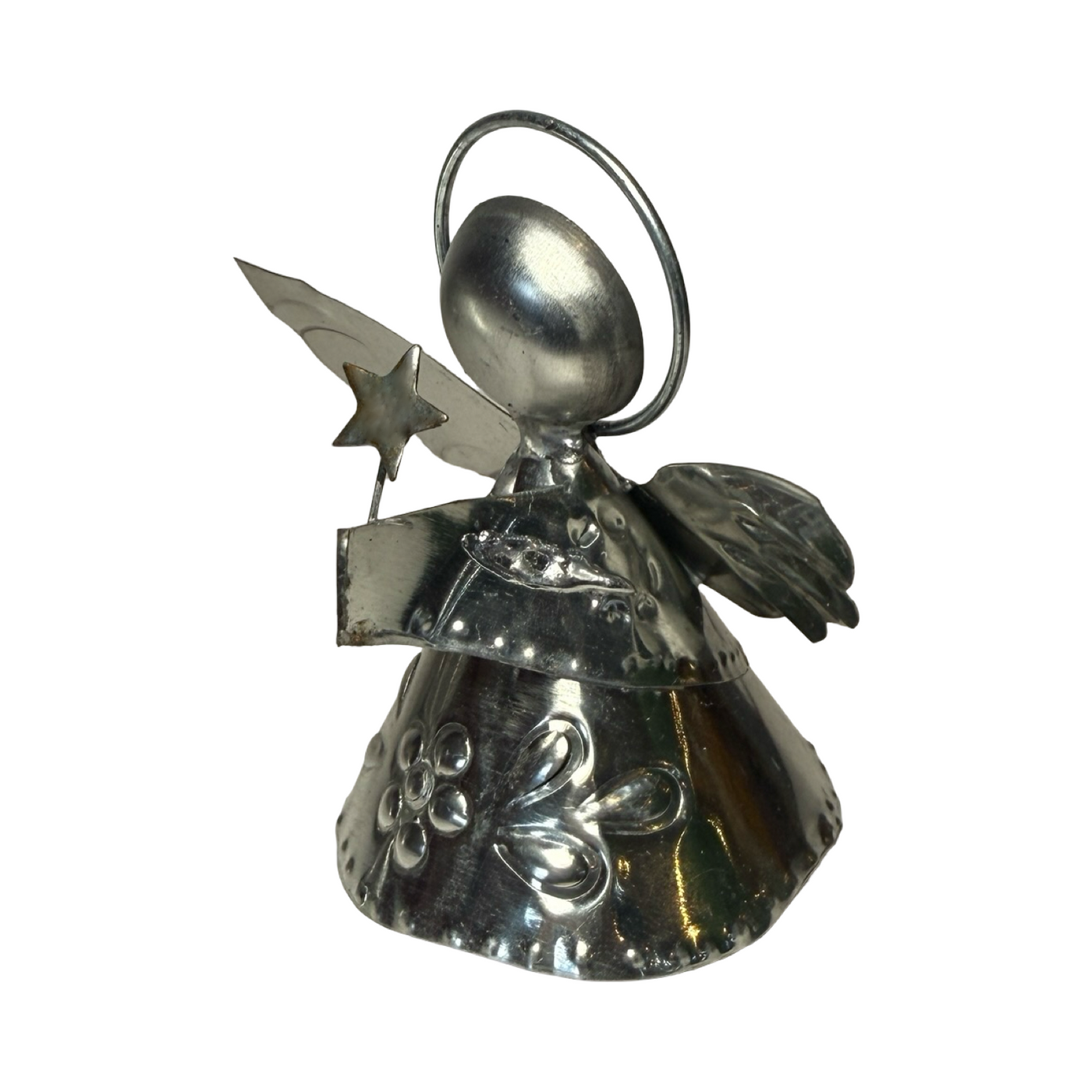 tin shaped angel holding a star wand