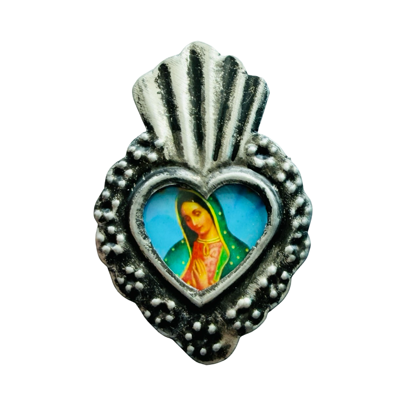 Silver heart-shaped pendant with detailed silver border and central image of the Virgin Mary.