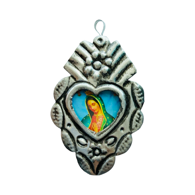 Silver heart-shaped pendant with detailed silver border and central image of the Virgin Mary.