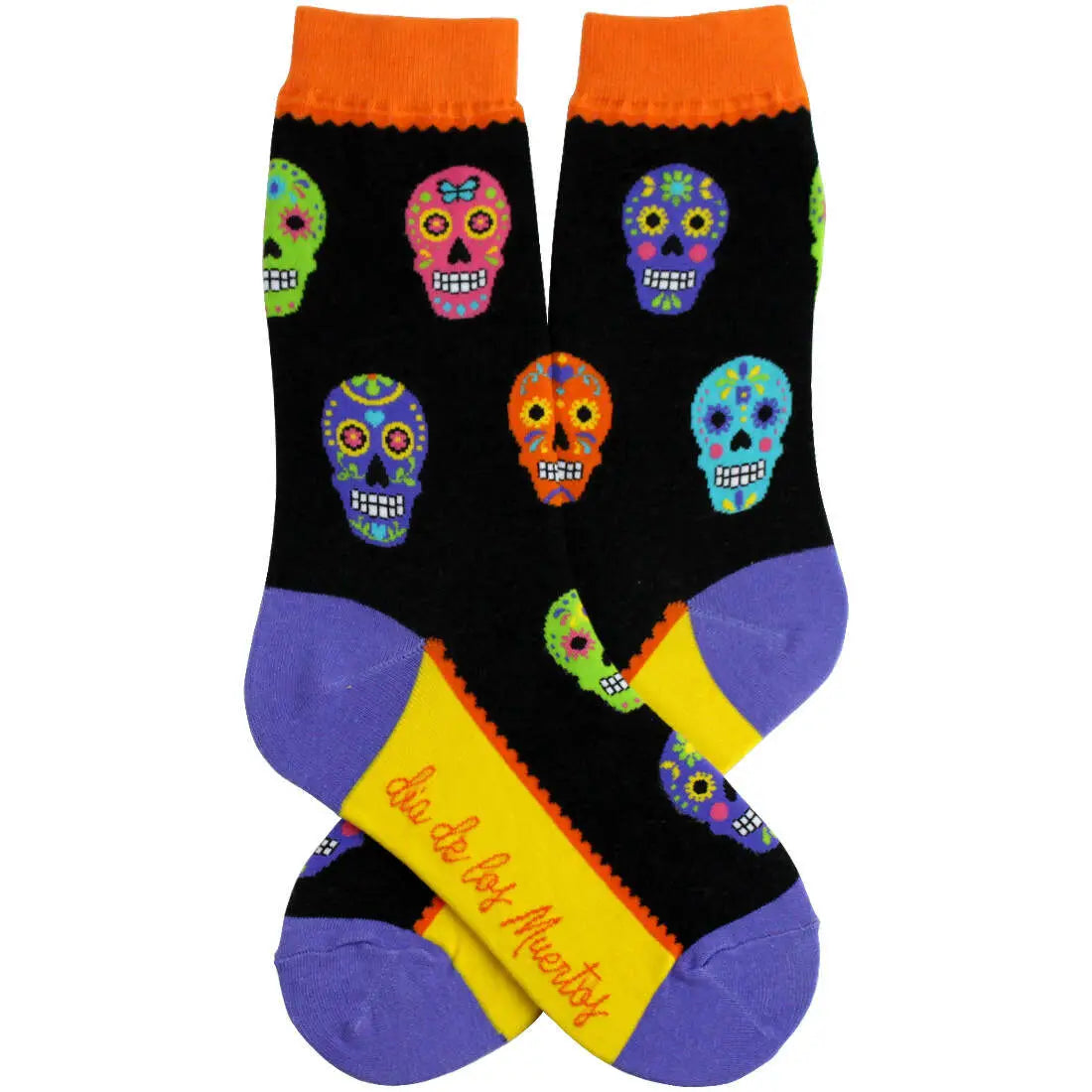 Black women’s socks with colorful sugar skull patterns, orange cuff, purple heel and toe, and yellow sole with “Día de los Muertos” text.