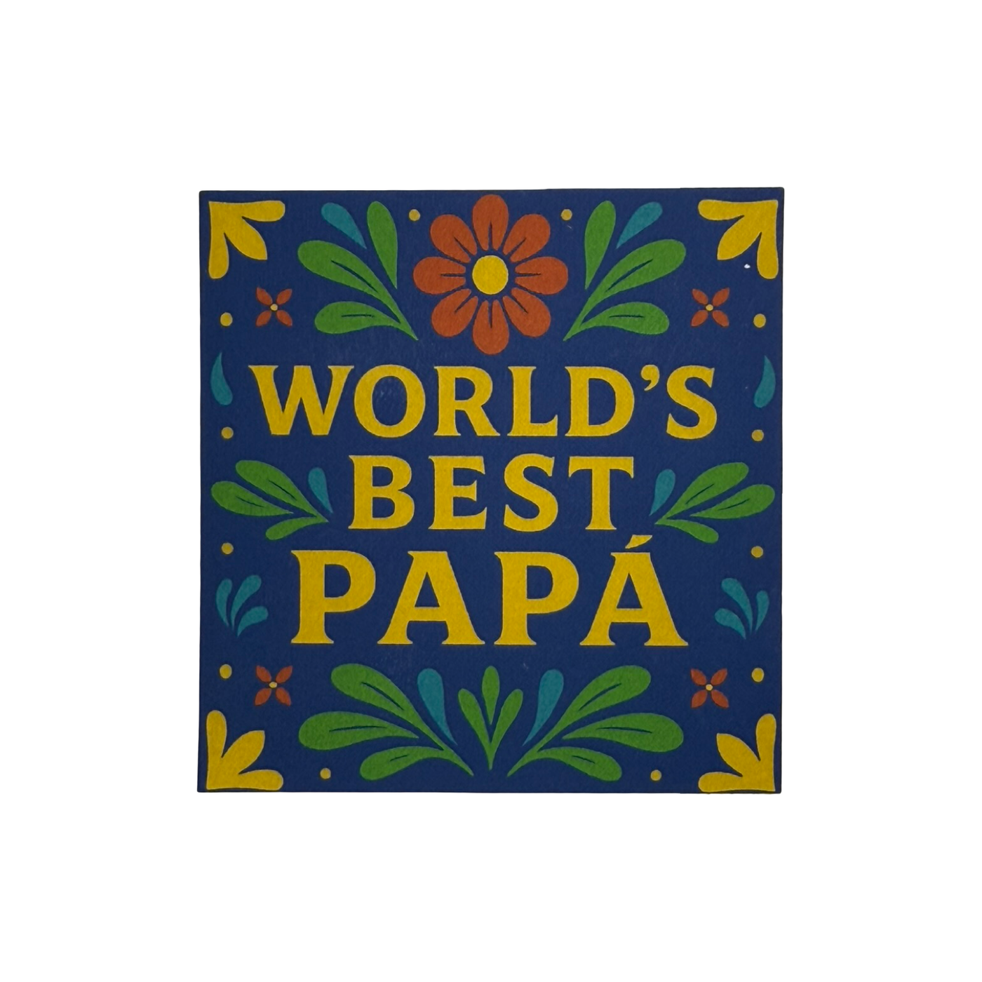 Square sticker with the words “WORLD’S BEST PAPÁ” in bold yellow text, framed by colorful flowers and green leaves on a navy blue background.