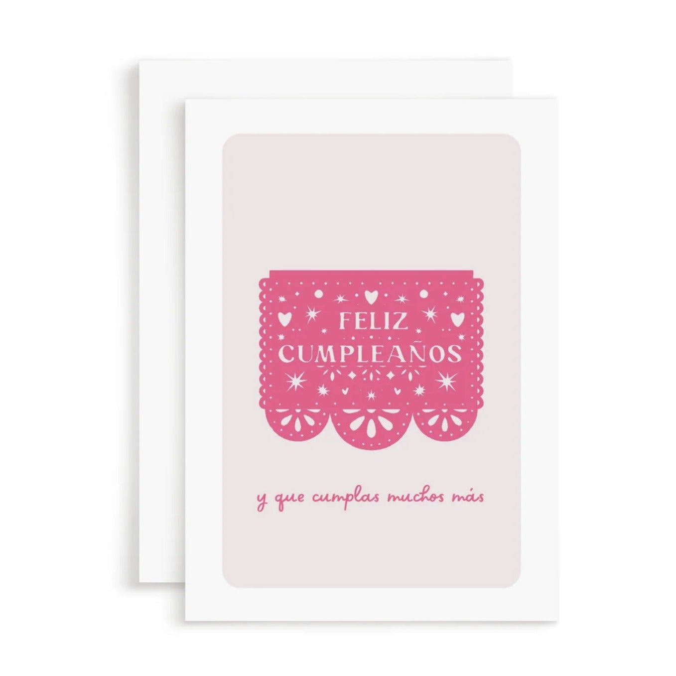 white card with a pink papel picado banner that says Feliz Cumpleanos and the phrase Y Que Cumplas Muchas Mas in pink lettering