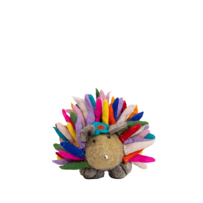 A handcrafted felt hedgehog doll with a beige wool body, tiny gray ears, and a bright, multicolored felt spike design, set against a white background.