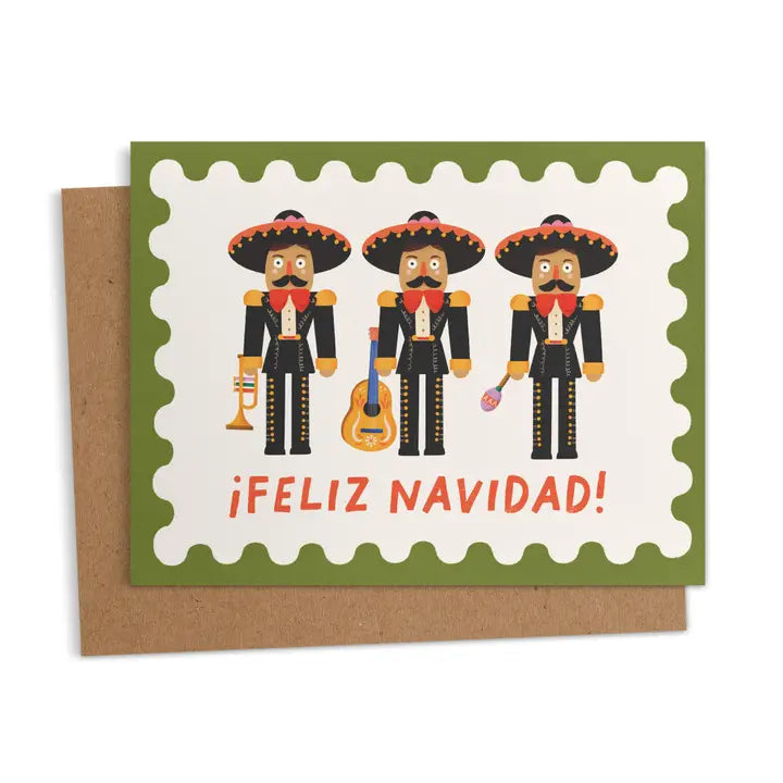 Greeting card with three mariachi nutcrackers holding a trumpet, guitar, and maracas, with the words “¡Feliz Navidad!” in red letters.