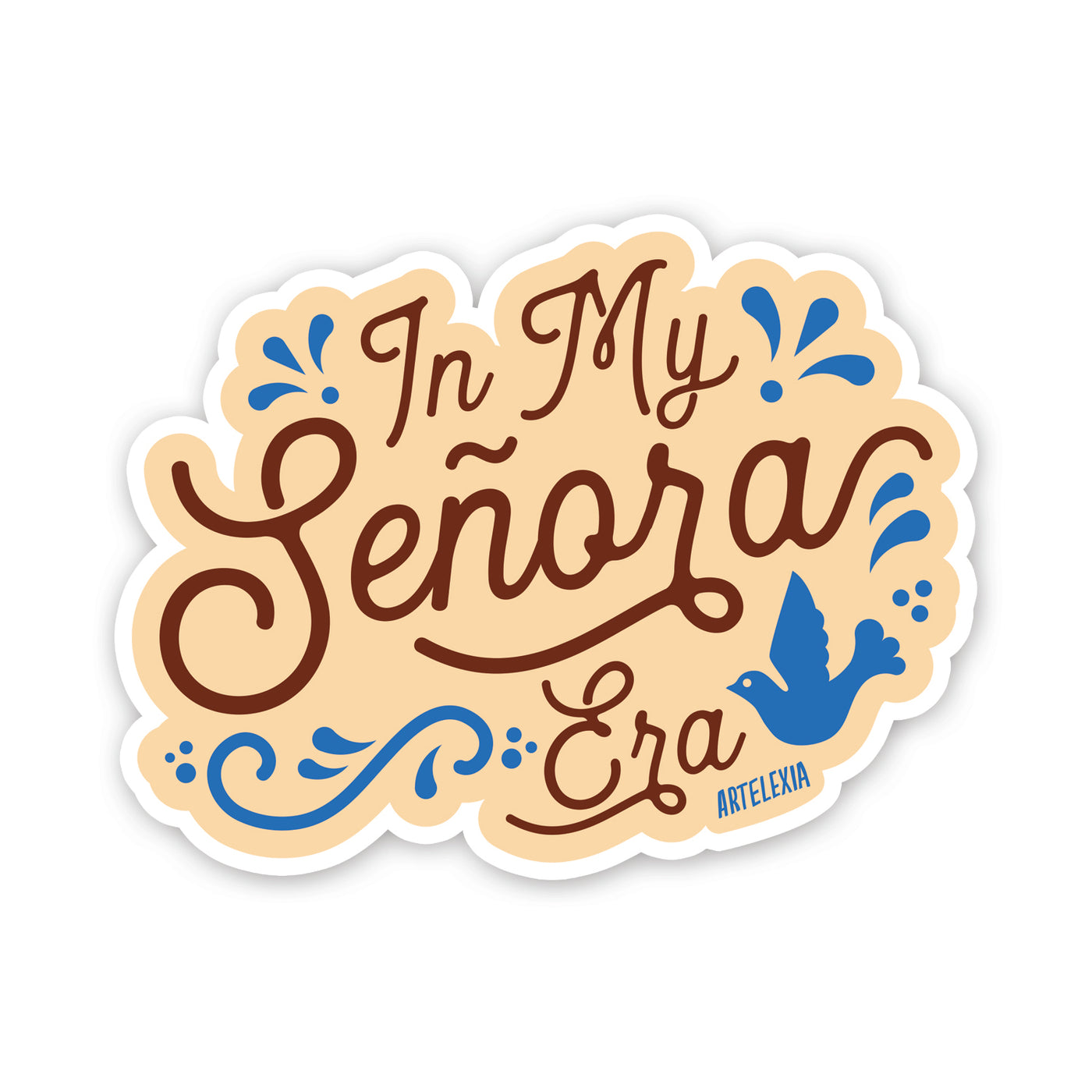 cream colored sticker with the phrase In My Senora Era in brown lettering with blue filagree and bird