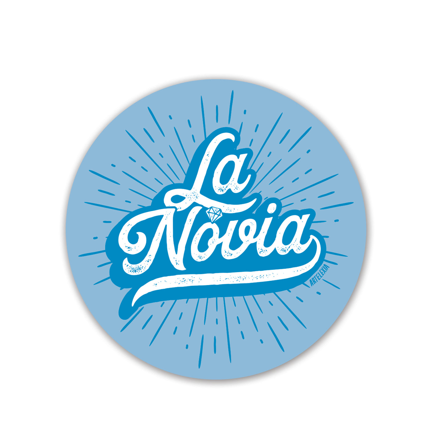 Round light blue circle sticker with the phrase La Novia in white lettering and features a diamond above the lettering "O."