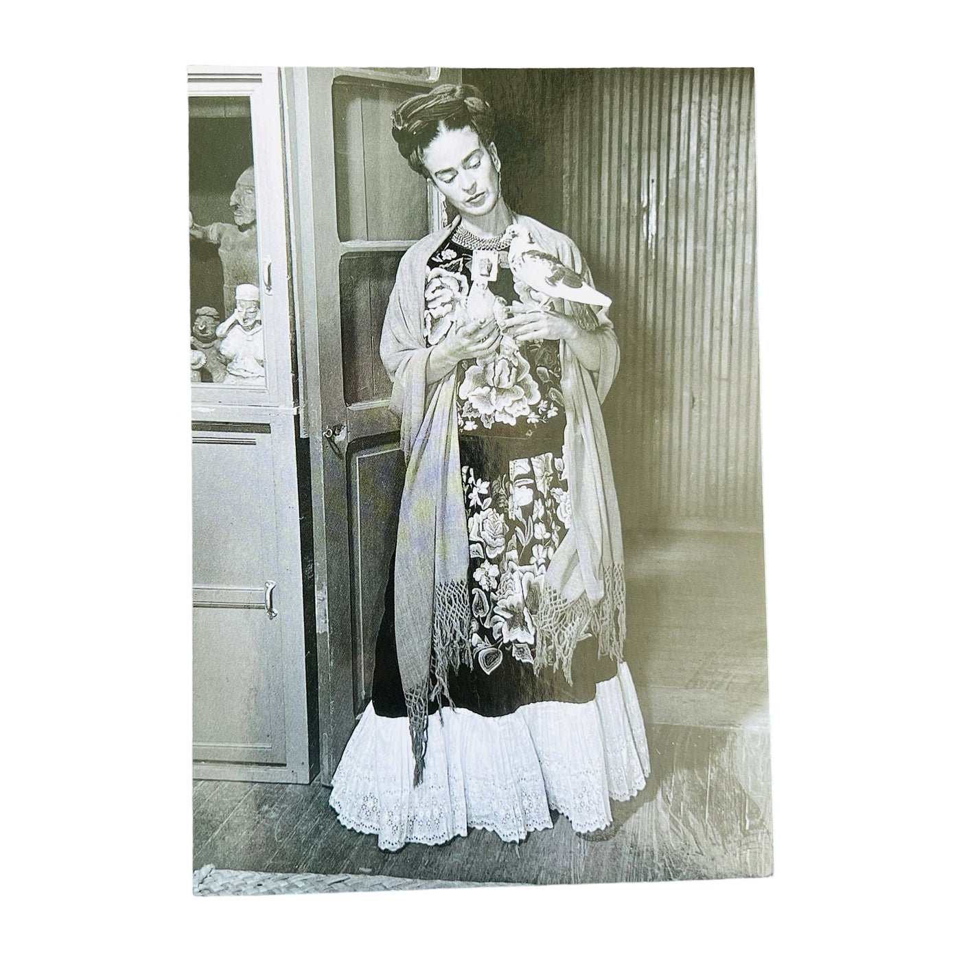 black and white portrait of Frida with two doves