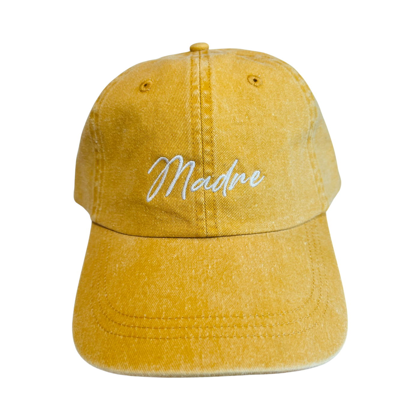 yellow hat with the word Madre in white lettering