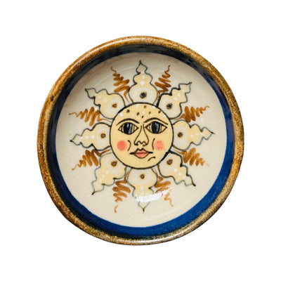 Yellow and blue stoneware bowl with an image of a smiling sun