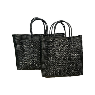 A set of Black Oaxacan woven handbags with short handles
