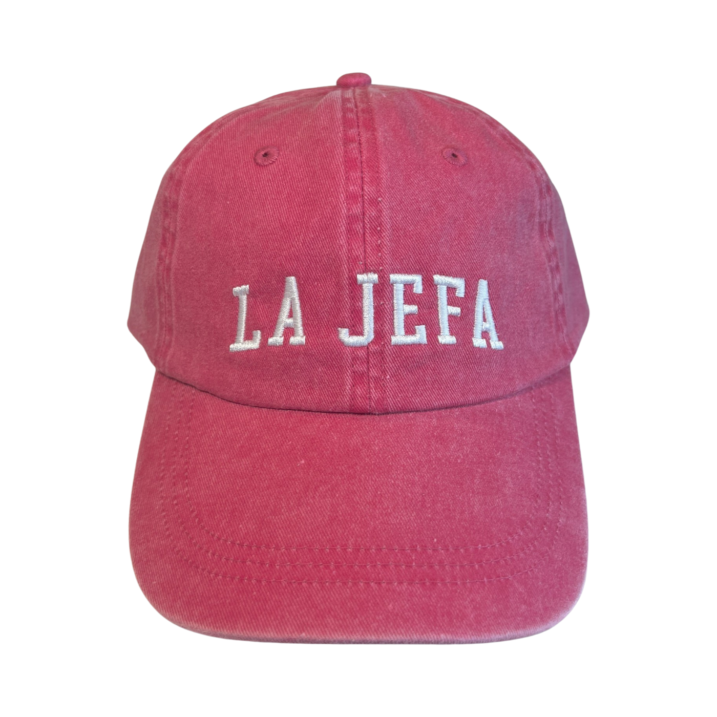 pink hat with the phrase La Jefa in white lettering.