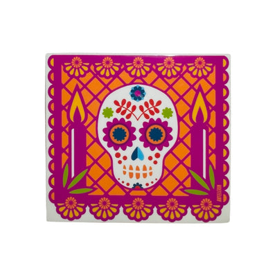 Square sticker of a hot pink papel picado with an image of coloful sugar skull flanked by two candles.