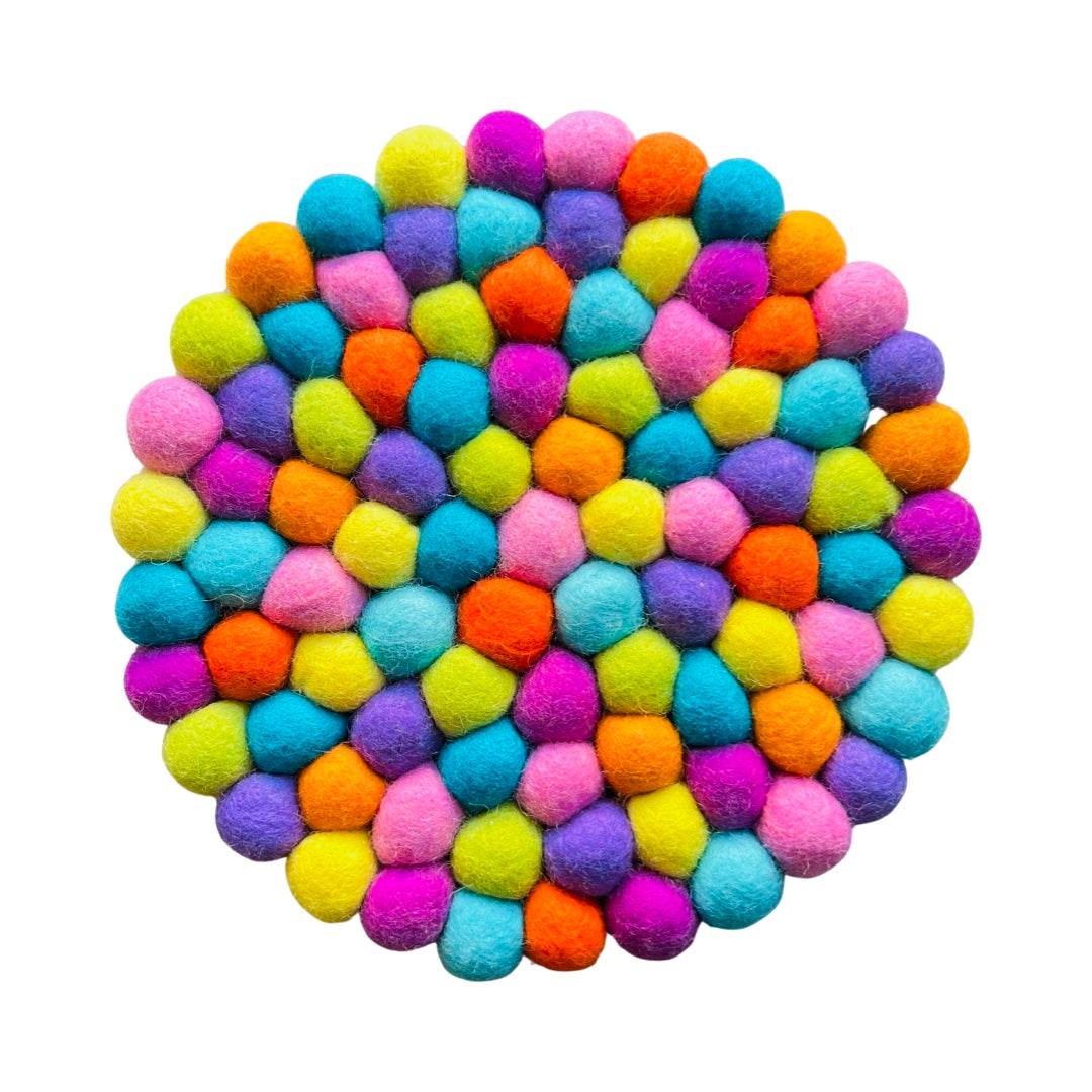 round pastel multi-colored felt pom pom trivet