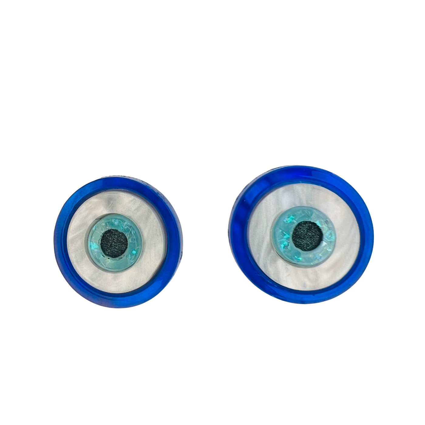 set of blue and white acrylic evil eye earrings