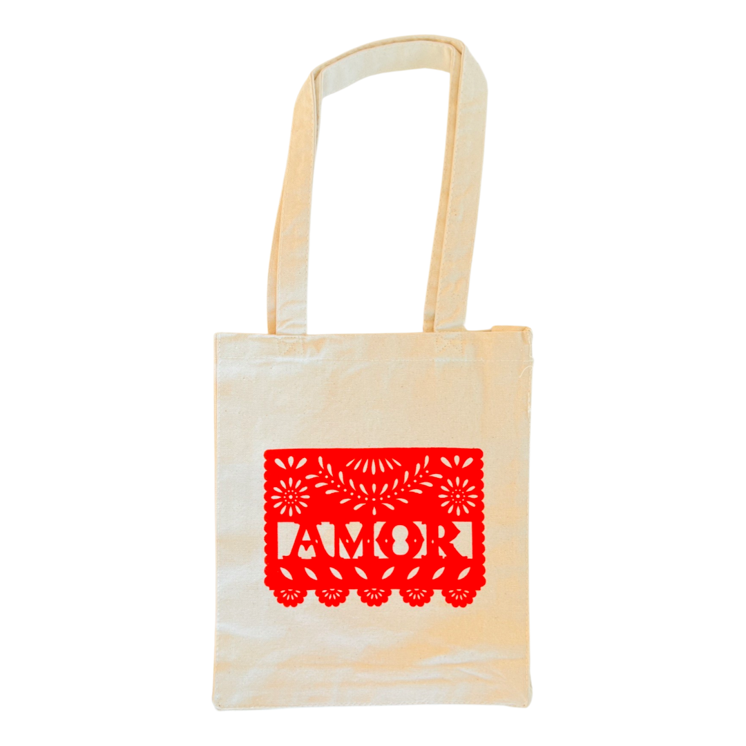 Natural tote bag with the word AMOR in red with a papel picado design