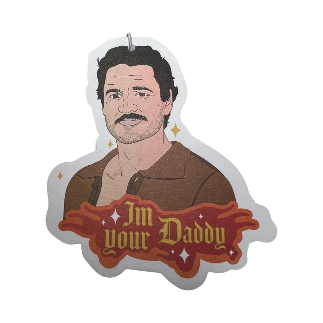 Freshener in the shape of Pedro Pascual wearing a brown shirt and the phrase I'm Your Daddy in yellow lettering with some red and orange flames.