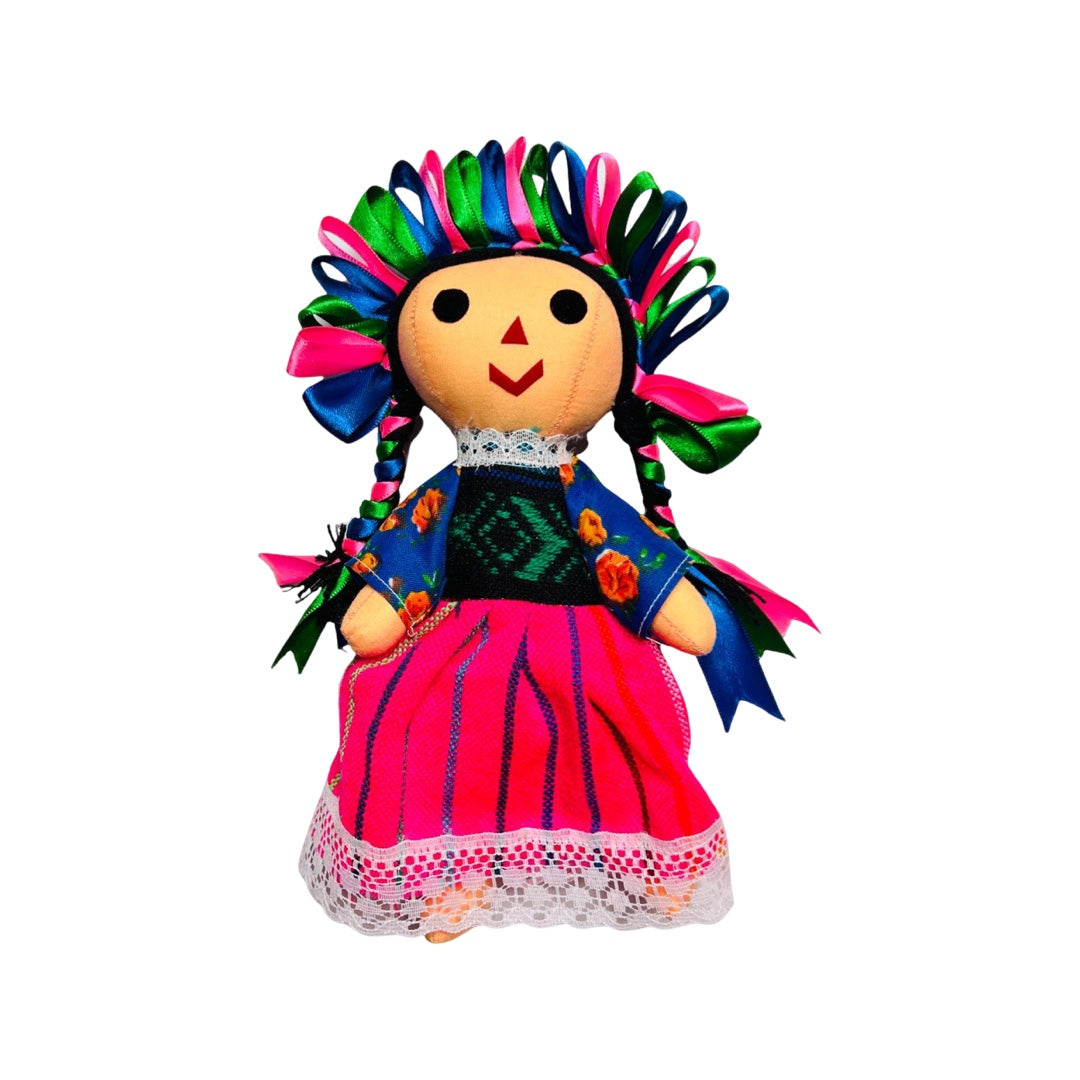 colorful Mexican maria doll with a pink striped dress and multi-colored ribbon head band.