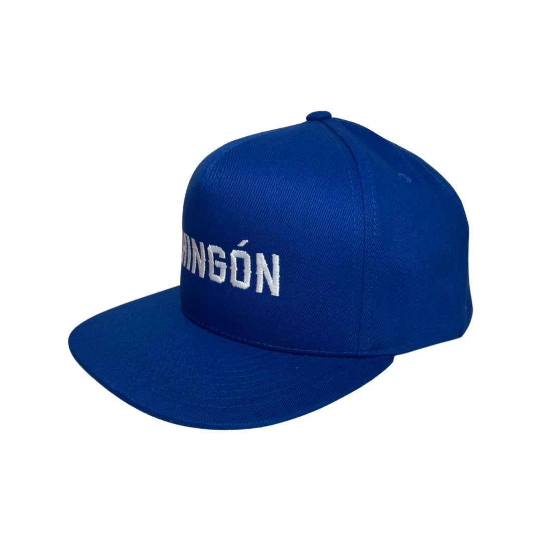 side view of a Blue snap back hat with the word Chingon in white lettering