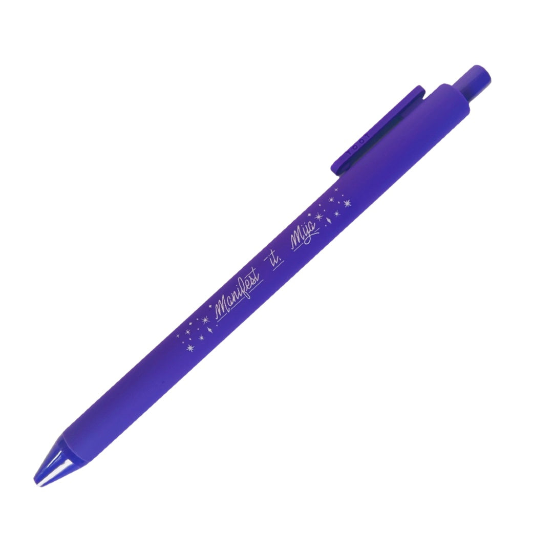 Purple pen with the phrase Manifest It Mija in silver lettering