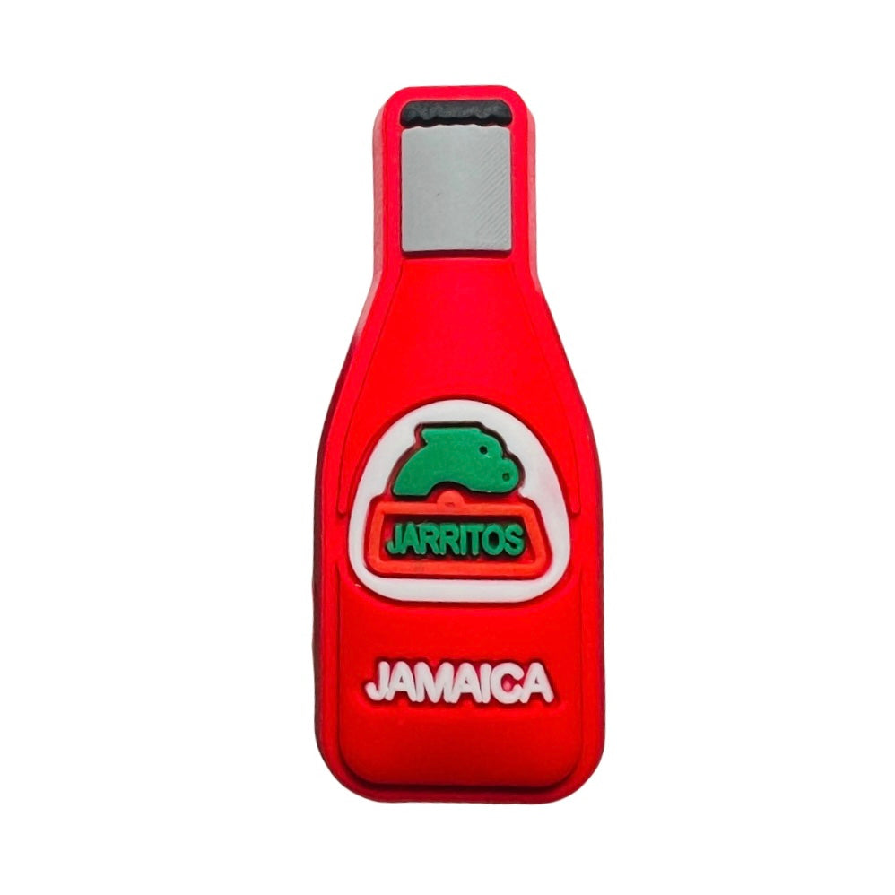 red bottle of Mexican soda in jamaica flavor chancla, or croc, charm.