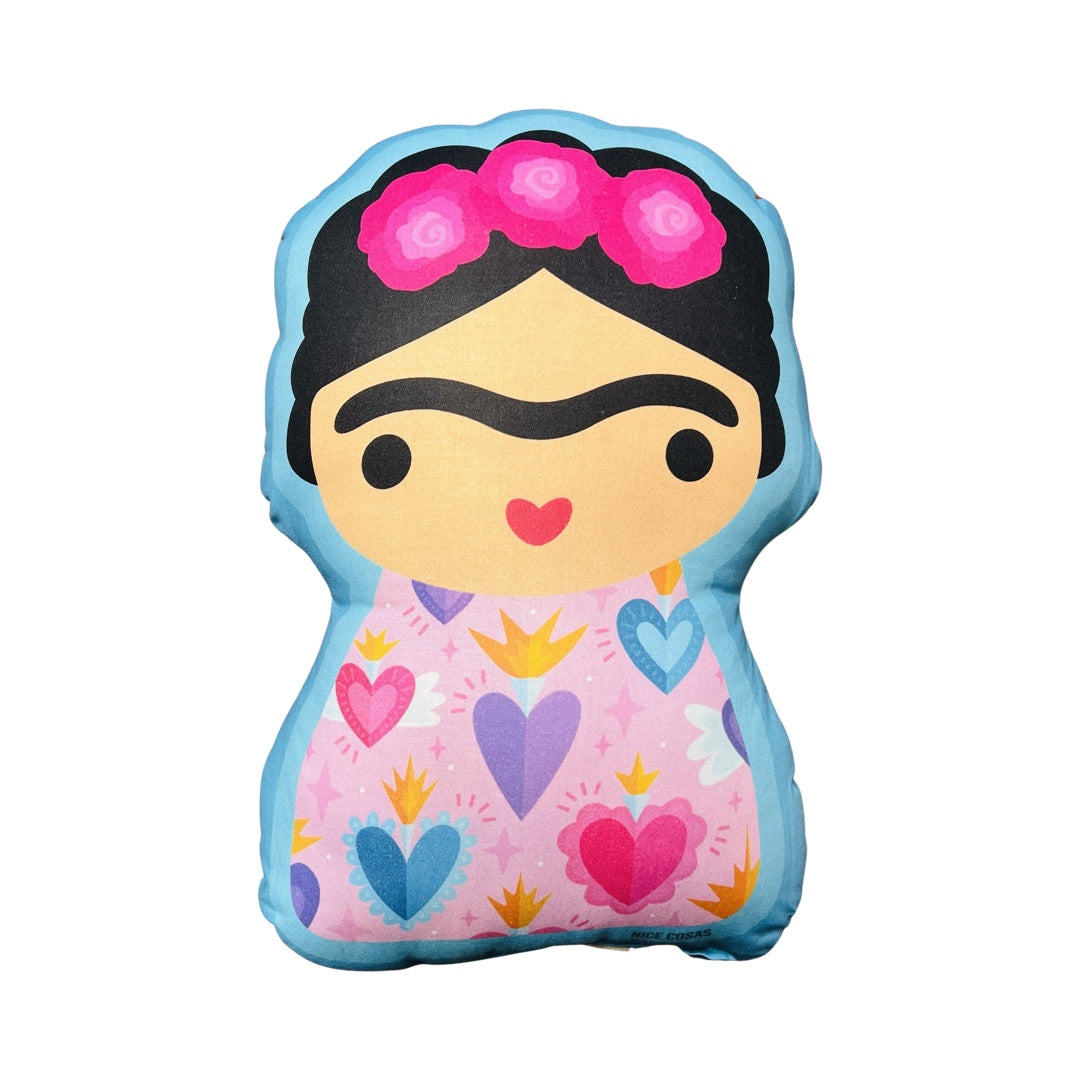 Pillow with an image of a Frida Khalo wearing a dress with milagro hearts