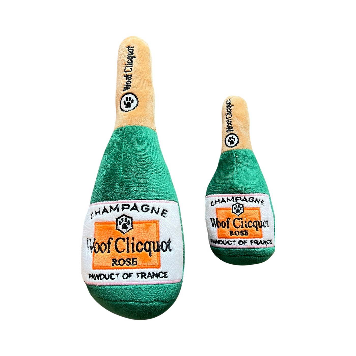 set of two Green plush dog toys, one smaller then the other, in the shape of a champagne bottle featuring a paw print and the phrase Woof Clicquot Rose' Champagne.