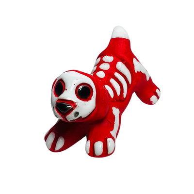 red ceramic skeleton dog