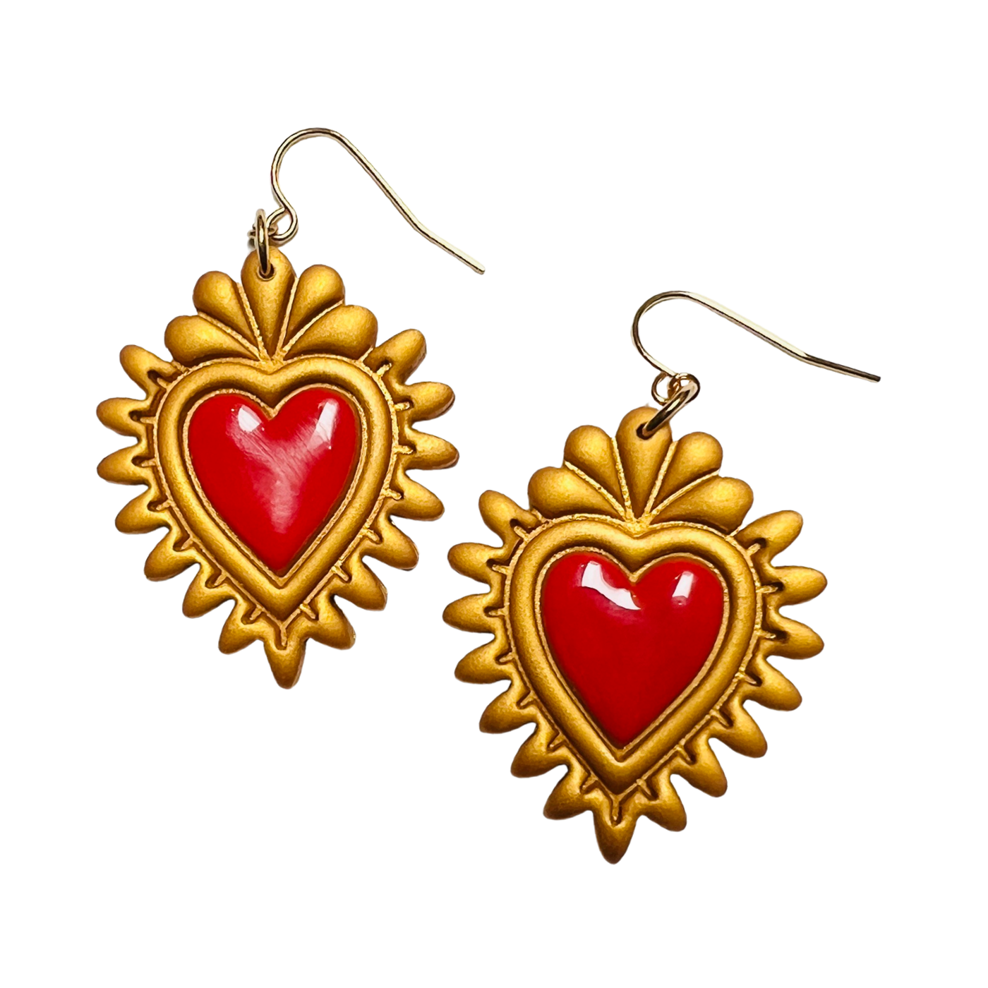 set of gold and red sacred heart earrings